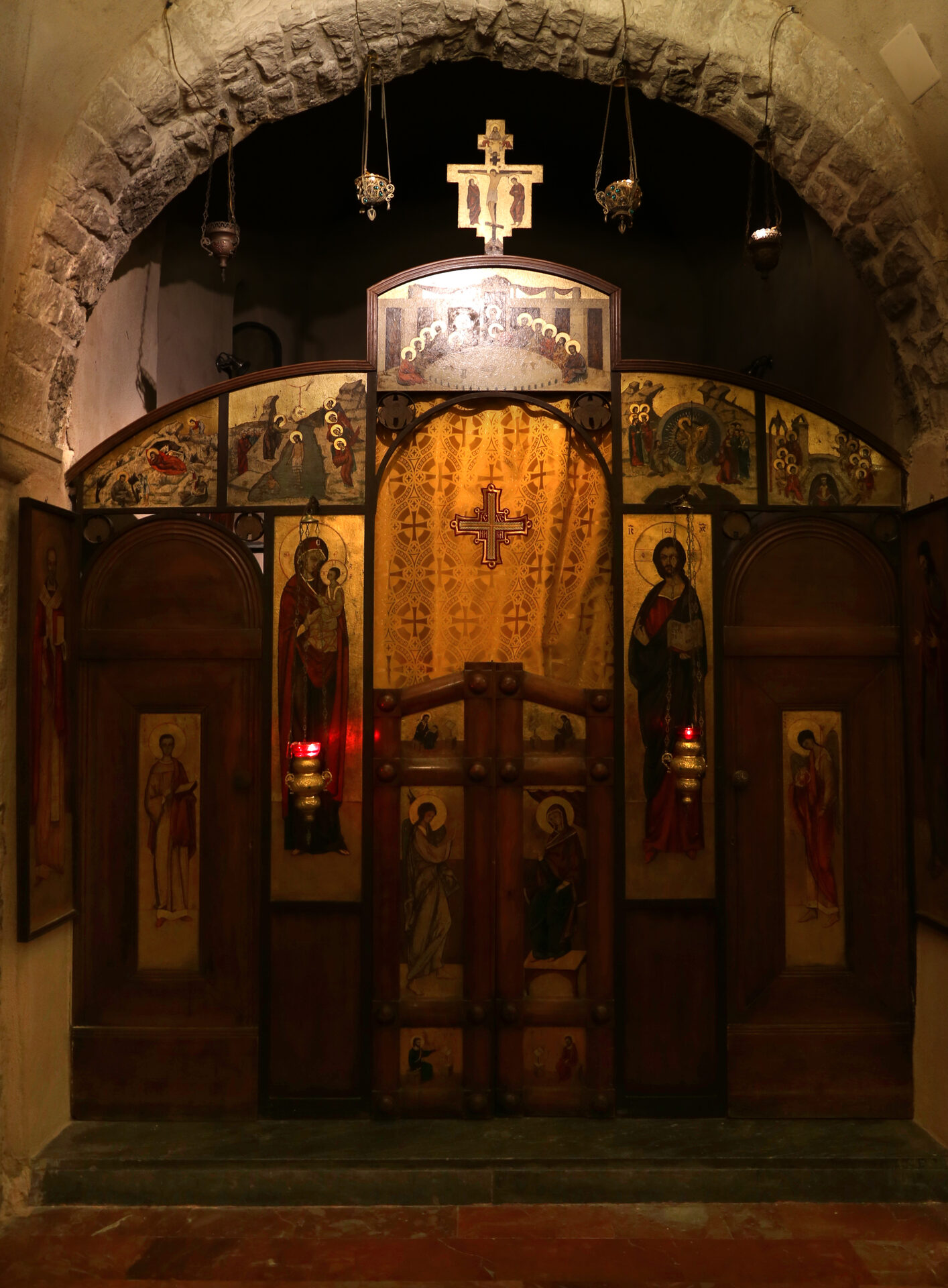 the iconostasis of the orthodox chapel in the crypt of the basilica of san nicola in bari with its icons and lamps