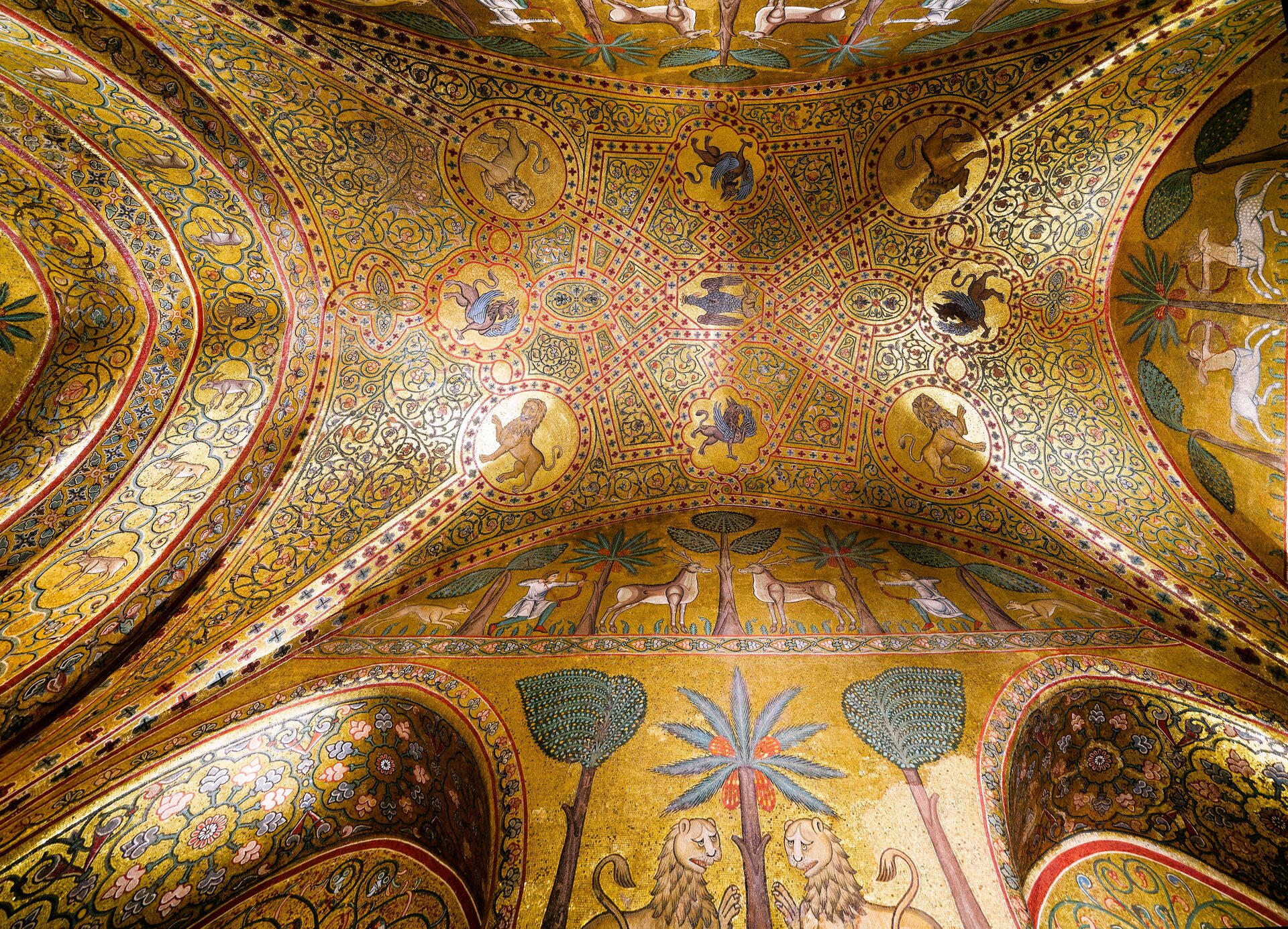a room in the royal apartments of the palazzo dei normanni with golden mosaic vaults