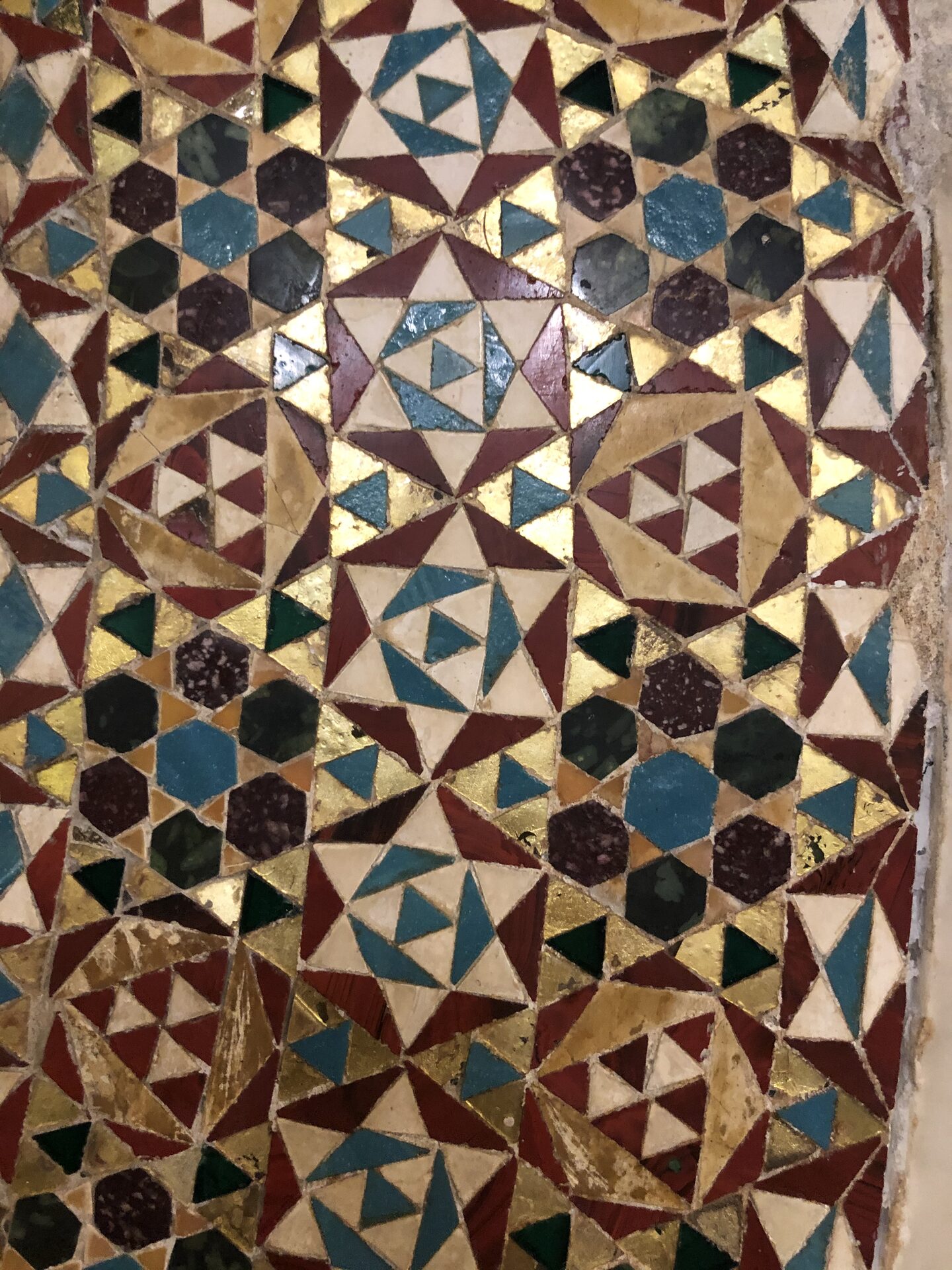 the opus sectile floor of the palatine chapel with porphyry discs and geometric inlay