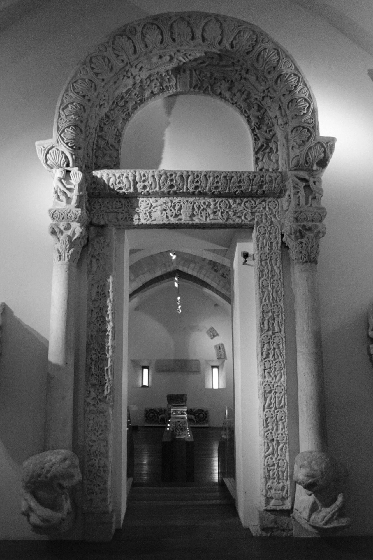 the plaster cast of the porta dei leoni of the basilica of san nicola displayed in the gypsotheque of the castle of bari