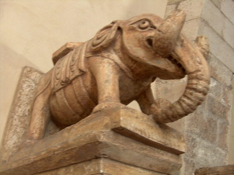 a plaster cast of a carved elephant, the bracket of a romanesque window, in the gypsotheque of the castle of bari