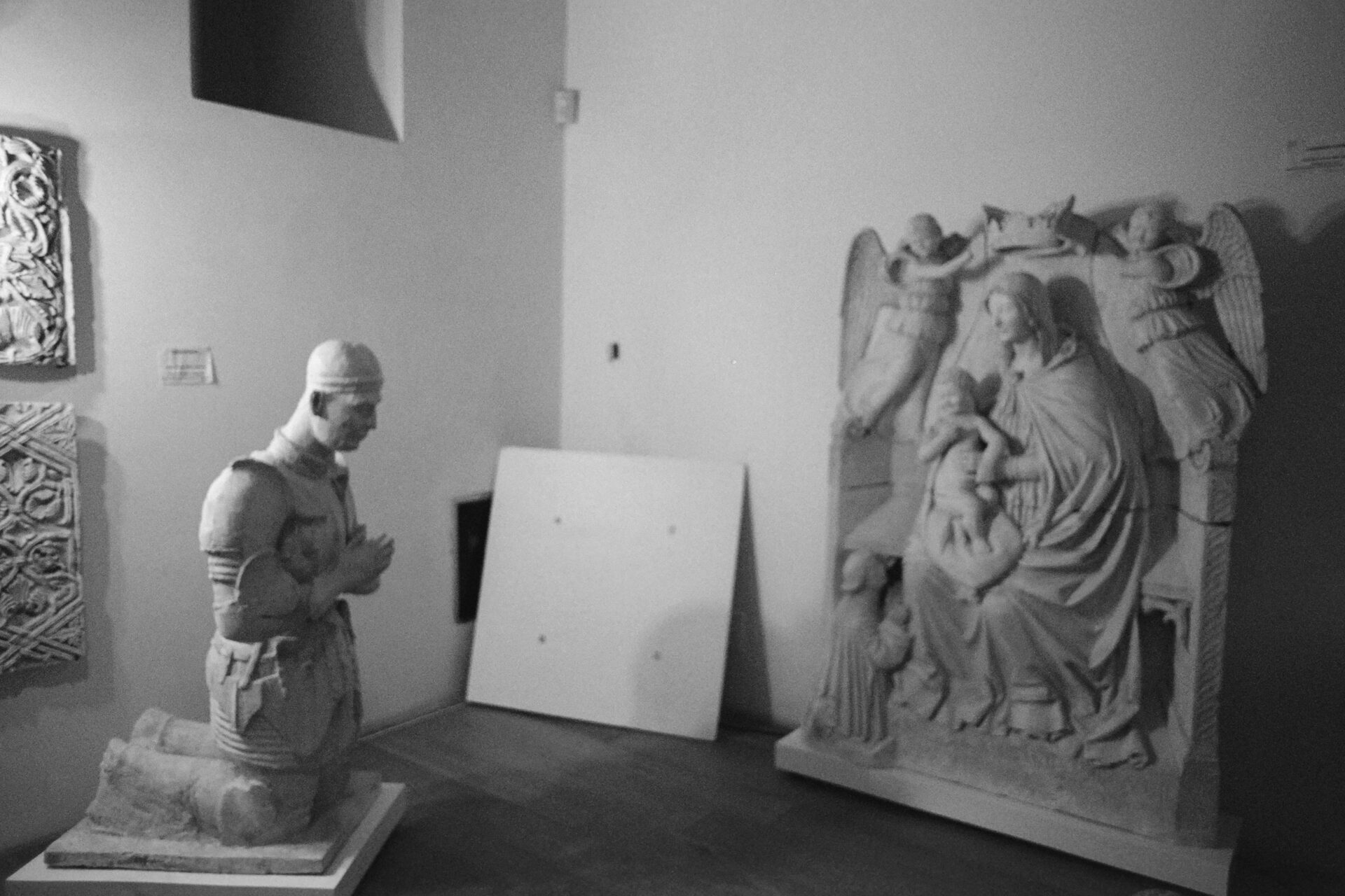 a room of the gypsotheque of the swabian castle of bari with the casts mounted on the wall and on plinths