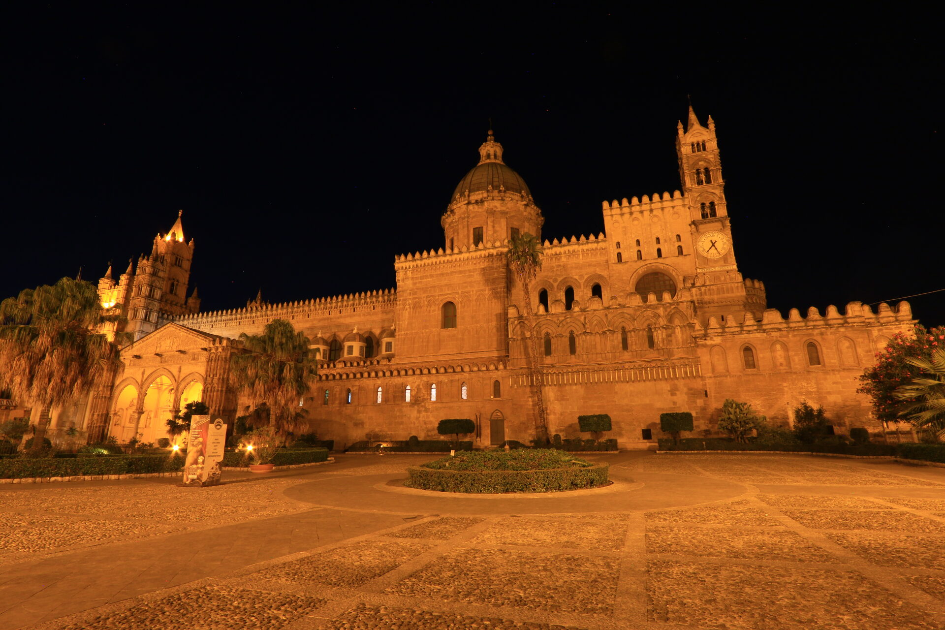 the norman apses of palermo cathedral with interlacing arcading and lava stone inlay
