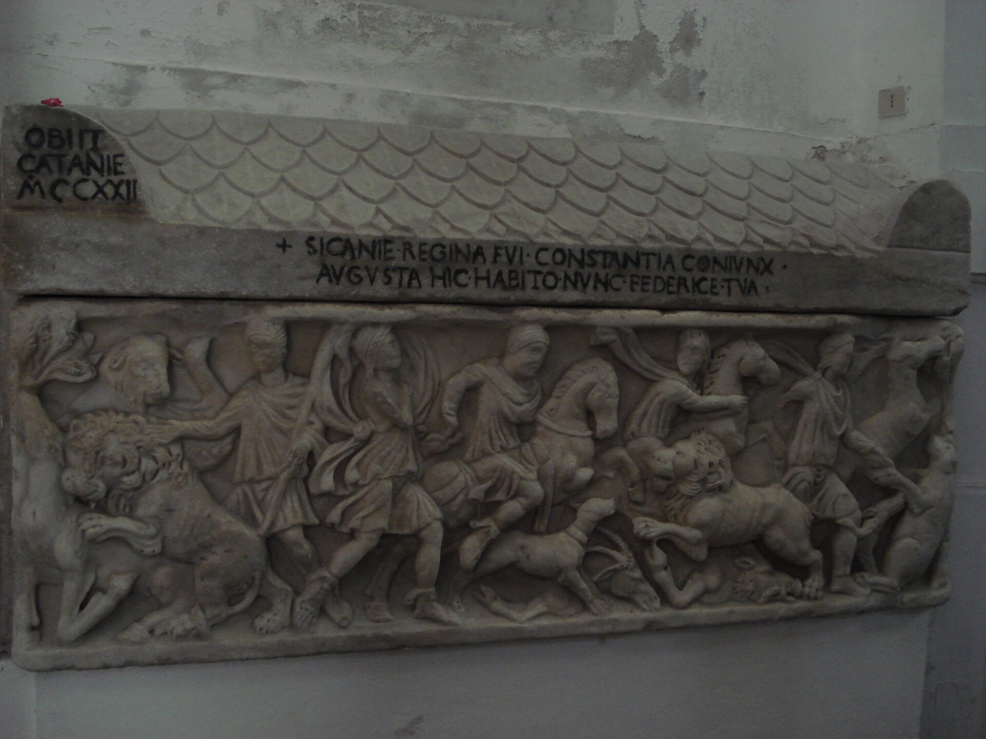 detail of the sarcophagus of constance of aragon with the relief of horsemen and lions