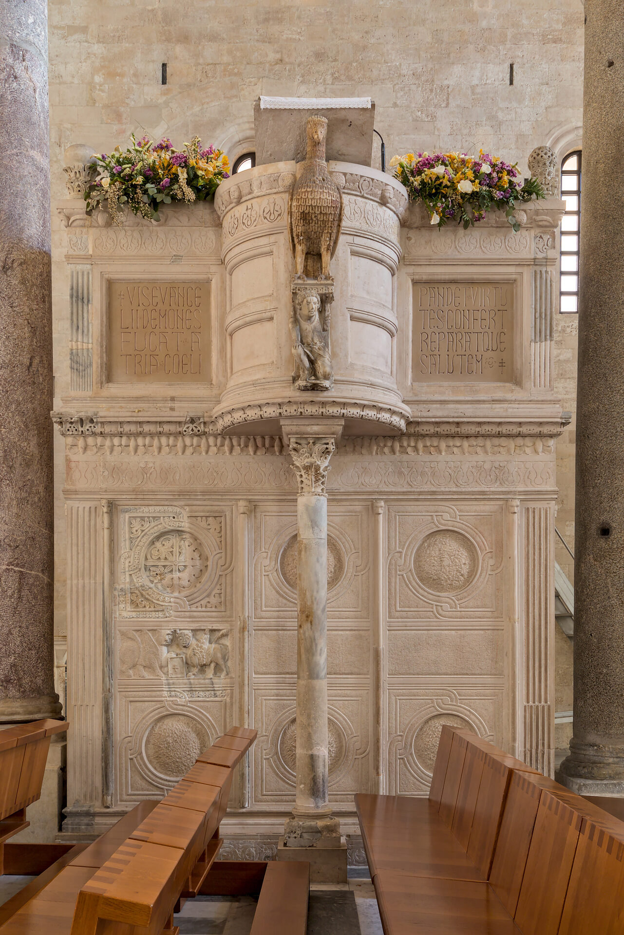the ambo of the cathedral of san sabino in bari made of carved slabs and colonnettes of different periods