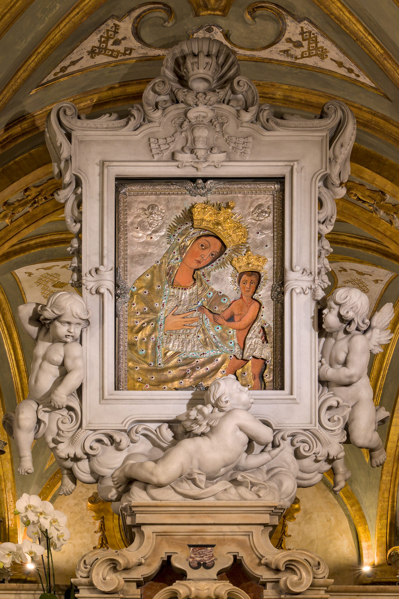 the icon of the madonna odegitria in the crypt of bari cathedral with its silver riza and eighteenth century frame