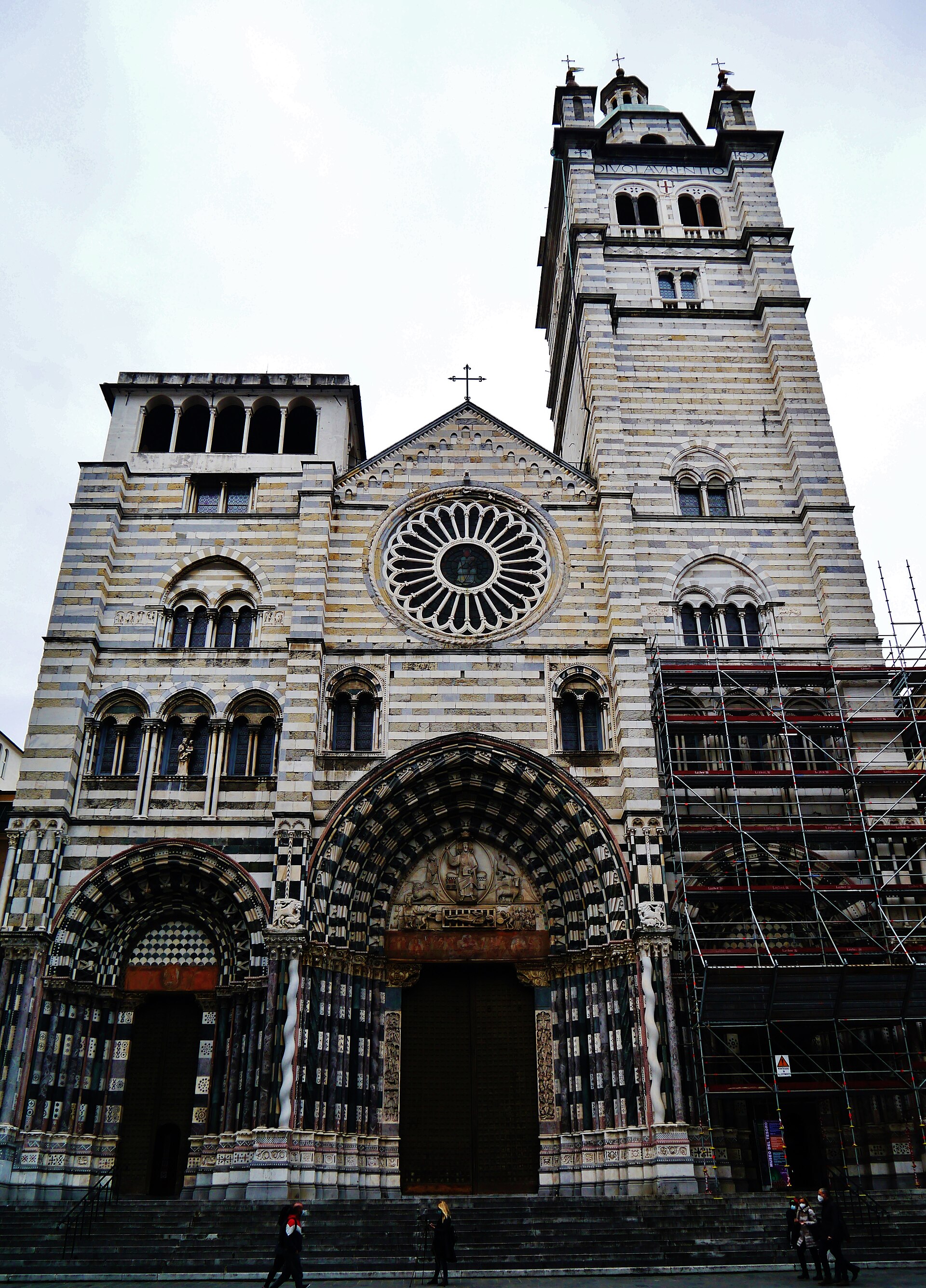 black and white striped facade of san lorenzo cathedral in genoa