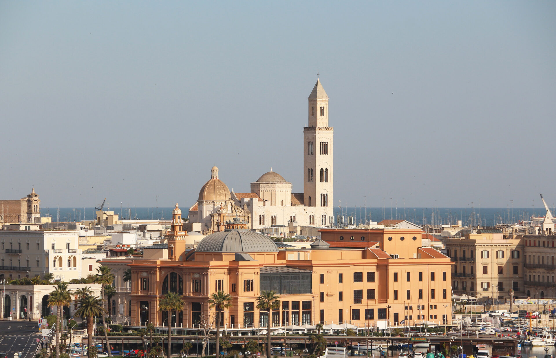 the seafront of bari seen from the water with the teatro margherita and the bell tower of the cathedral of san sabino behind