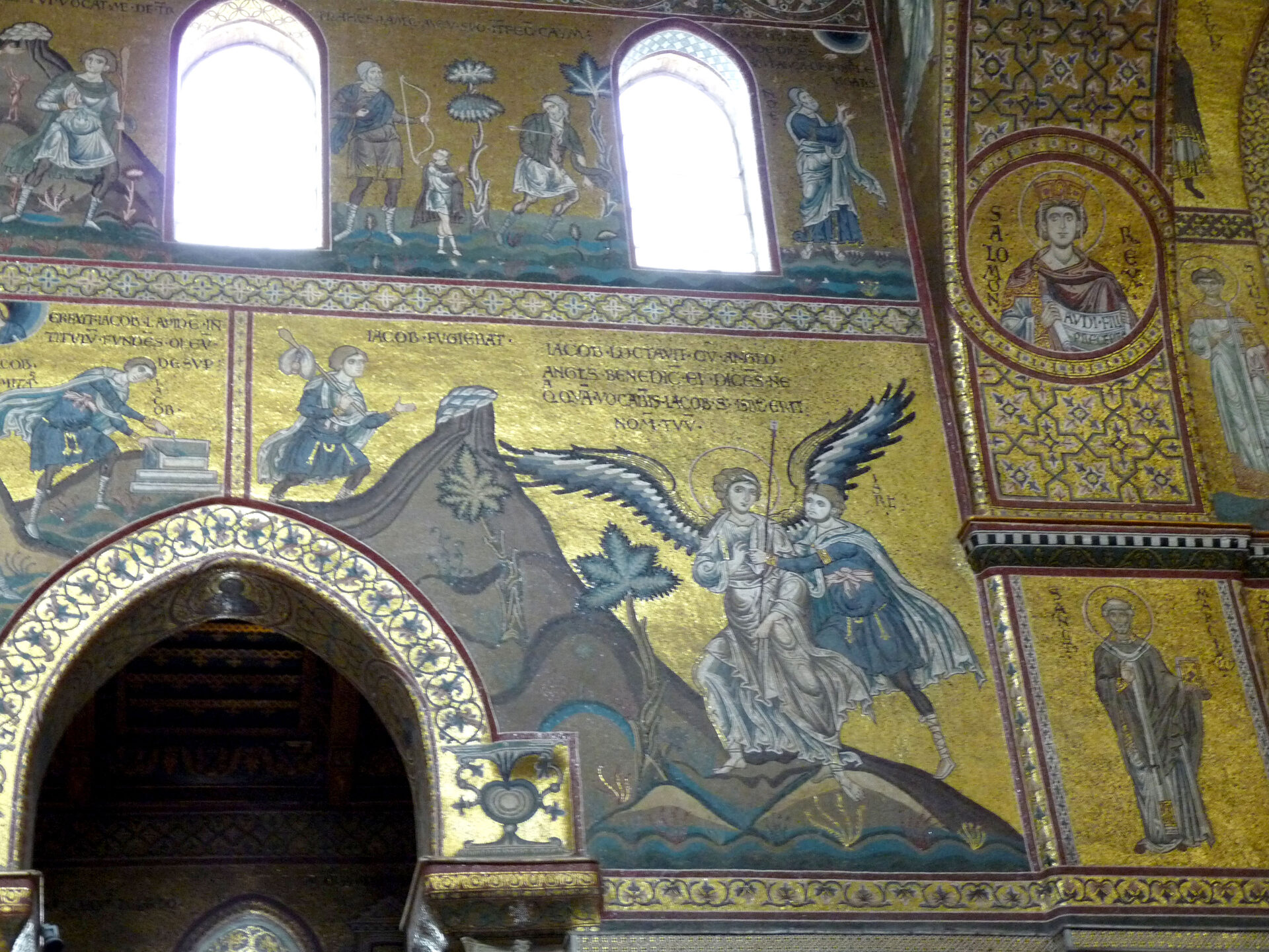 the gold ground mosaics of monreale cathedral with the biblical scenes and the nave windows