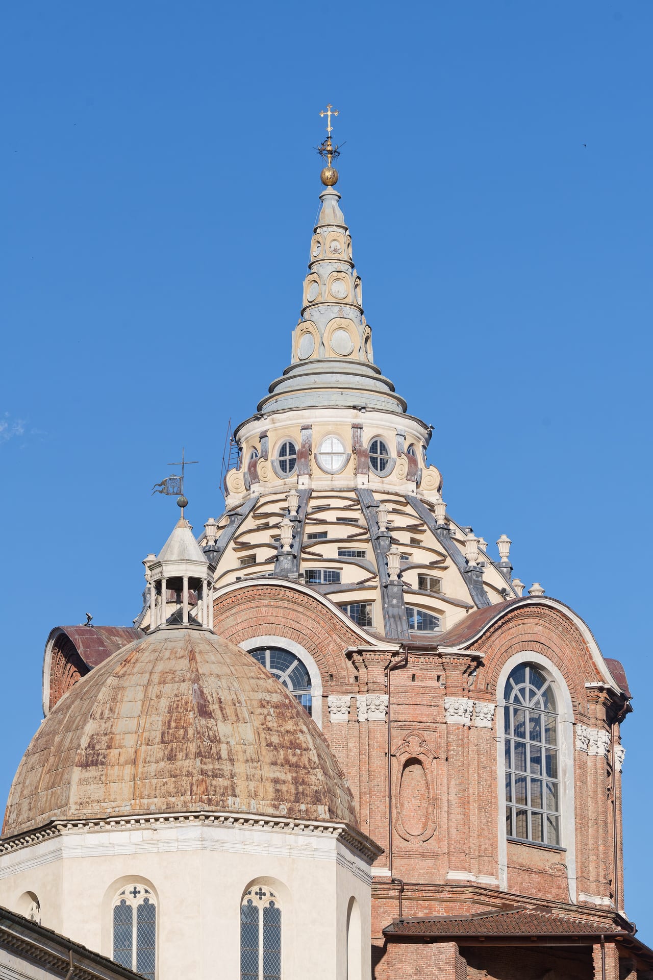the conical dome of guarino guarini chapel of the shroud seen from outside, behind the dome of turin cathedral