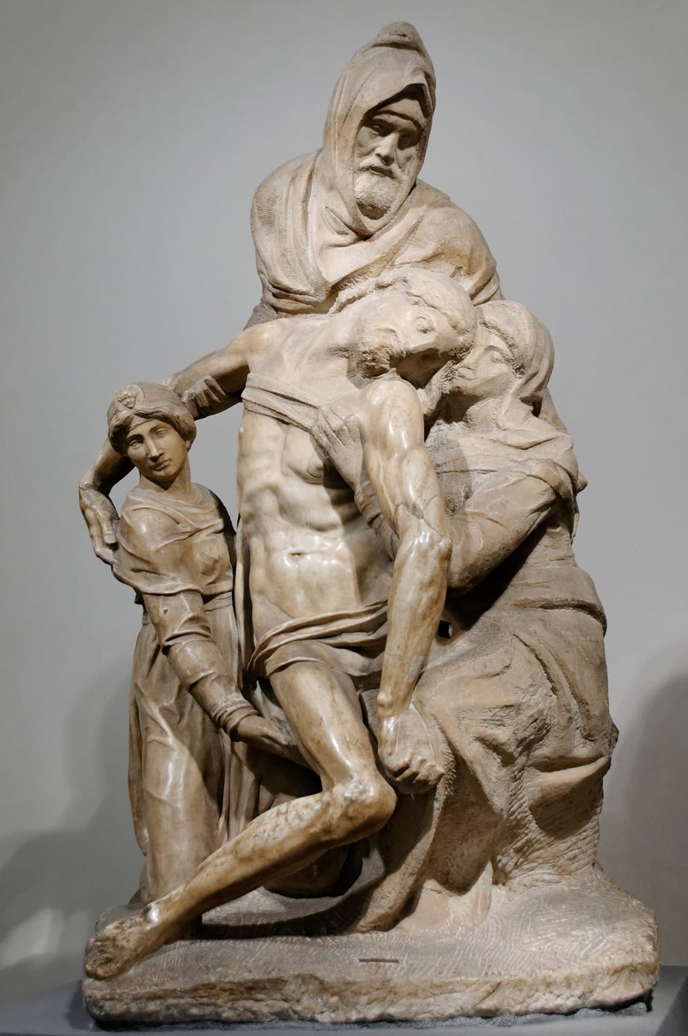 la piedad bandini de miguel ángel con la figura encapuchada que sostiene el cuerpo de cristo