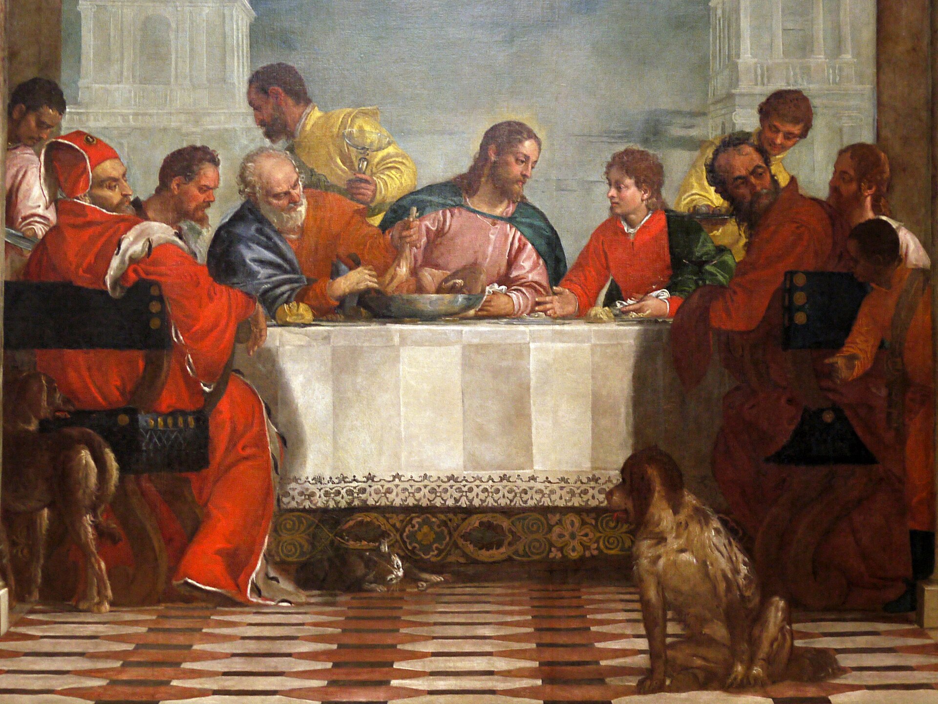 la parte centrale del convito in casa di levi di paolo veronese con cristo a tavola e i cani in primo piano