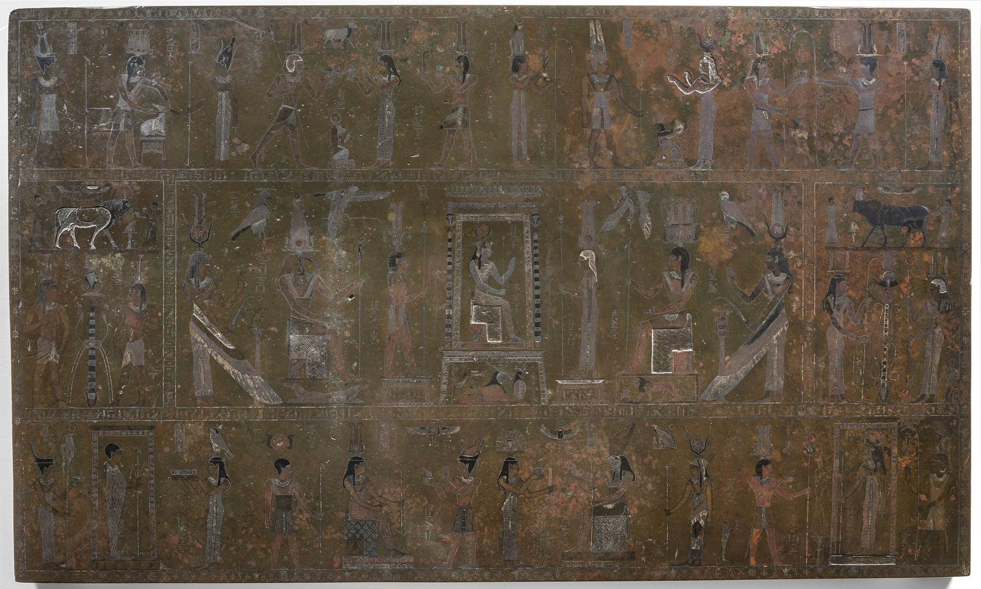 the mensa isiaca at the museo egizio in turin, a bronze tablet inlaid with silver showing gods and hieroglyphs in three registers