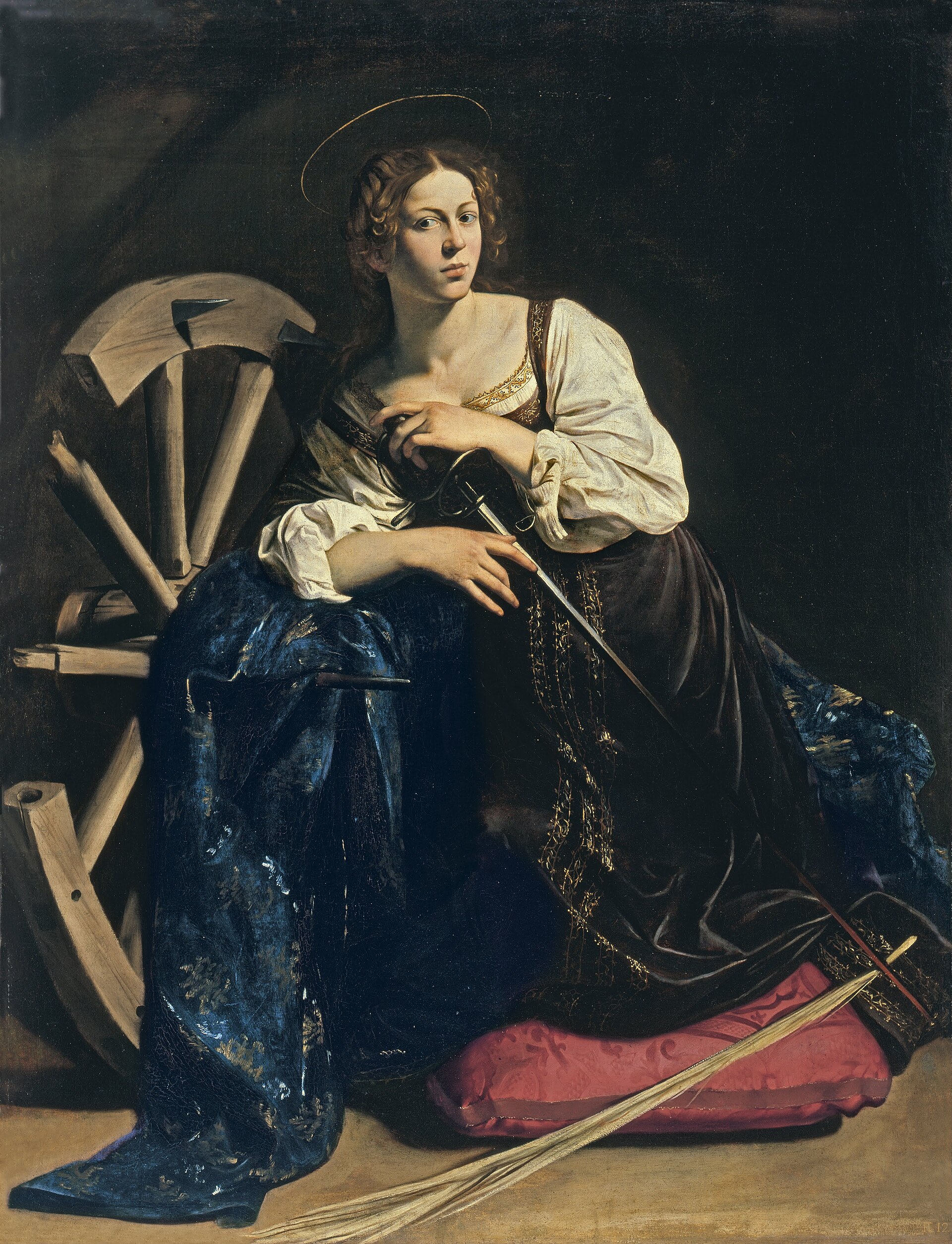 saint catherine of alexandria by caravaggio, a young woman kneeling on a red cushion beside a broken wooden wheel, with a sword in her hand and a palm at her feet