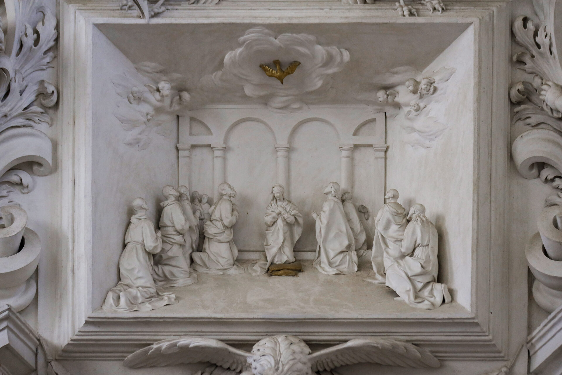 the relief of pentecost in the oratory of santa cita inside its modelled stucco frame