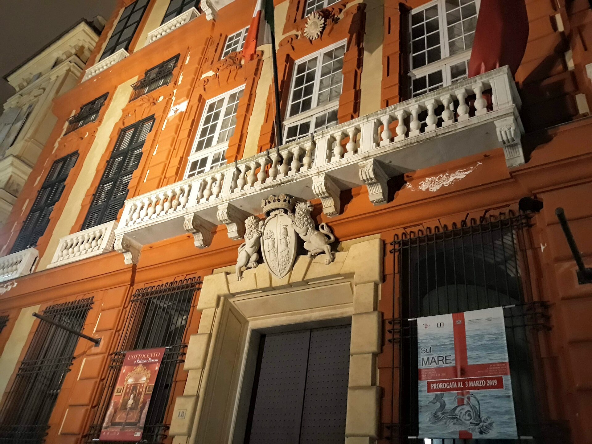 detail of the painted facade of palazzo rosso in genoa