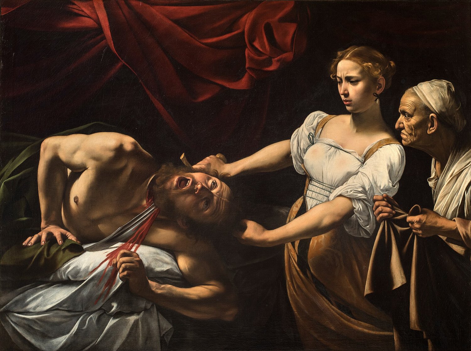 la Giuditta che decapita Oloferne di Caravaggio, con la lama già nel collo e la serva che guarda