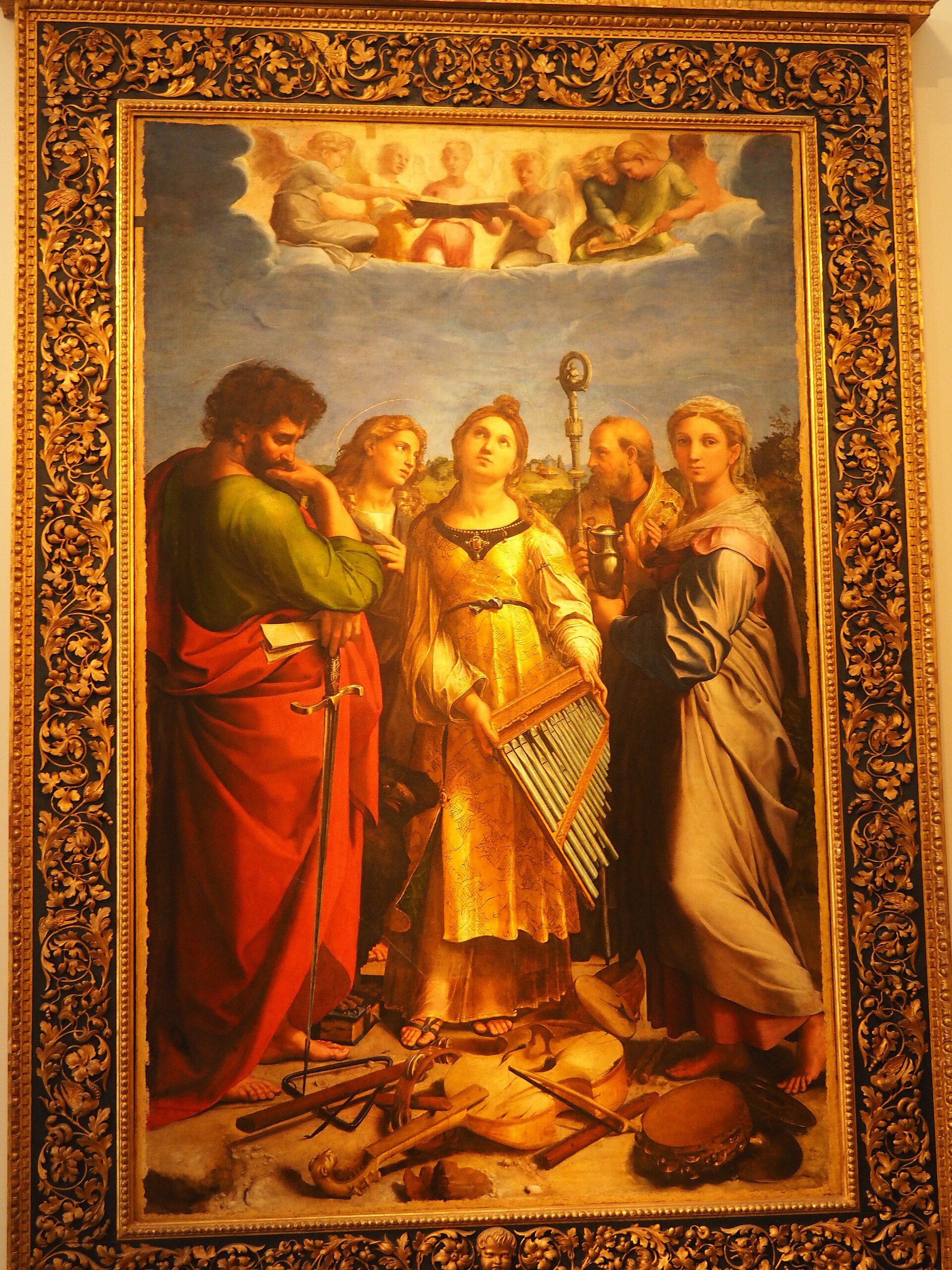 l estasi di santa cecilia di raffaello nella pinacoteca nazionale di bologna, con la santa che lascia cadere gli organetti