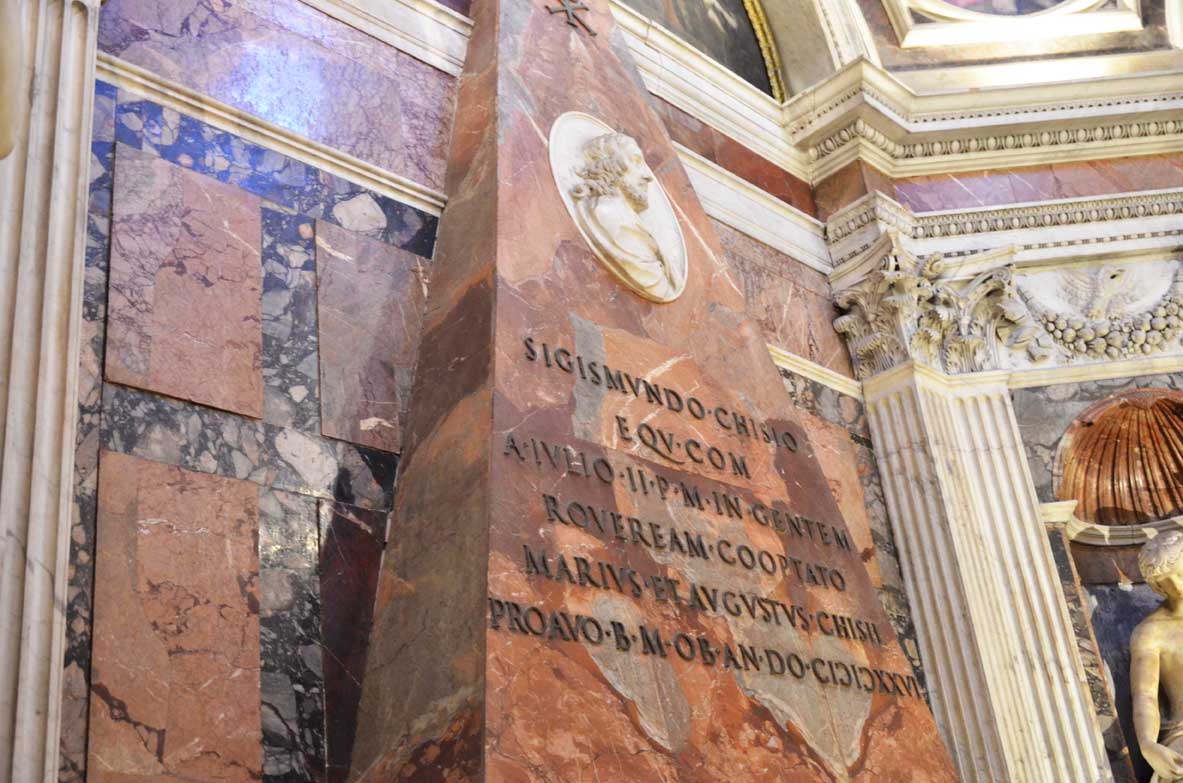 a pyramid tomb in the Chigi Chapel of Santa Maria del Popolo
